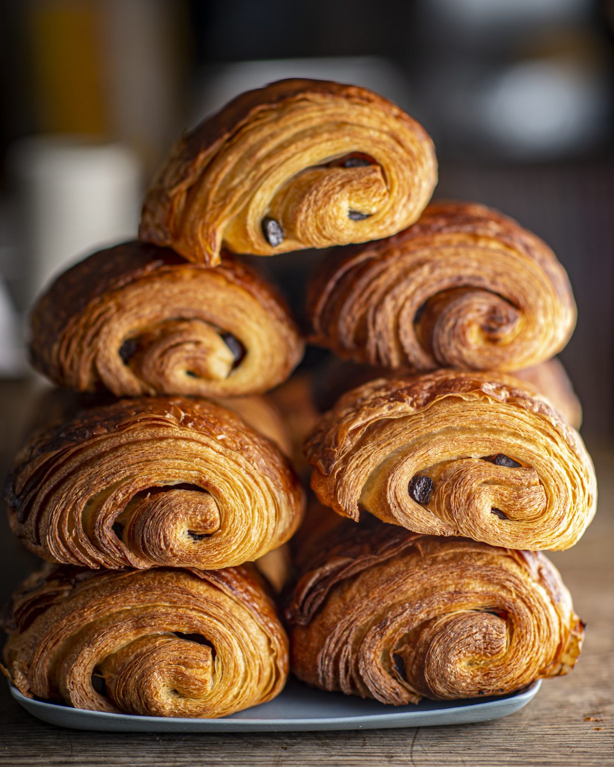Delicious Pain au Chocolat pastry on a plate, freshly baked and filled with rich chocolate.