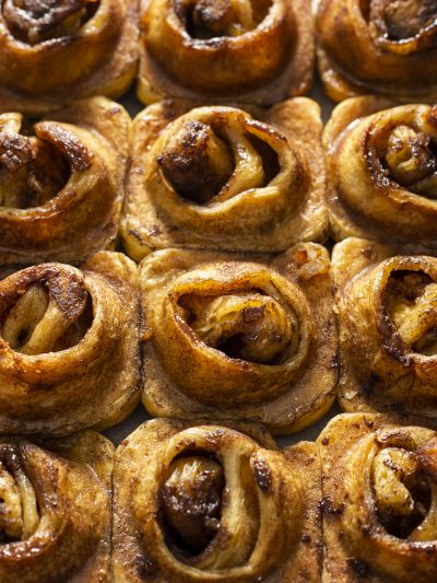 Golden-brown cinnamon morning bun, freshly baked and enticingly aromatic